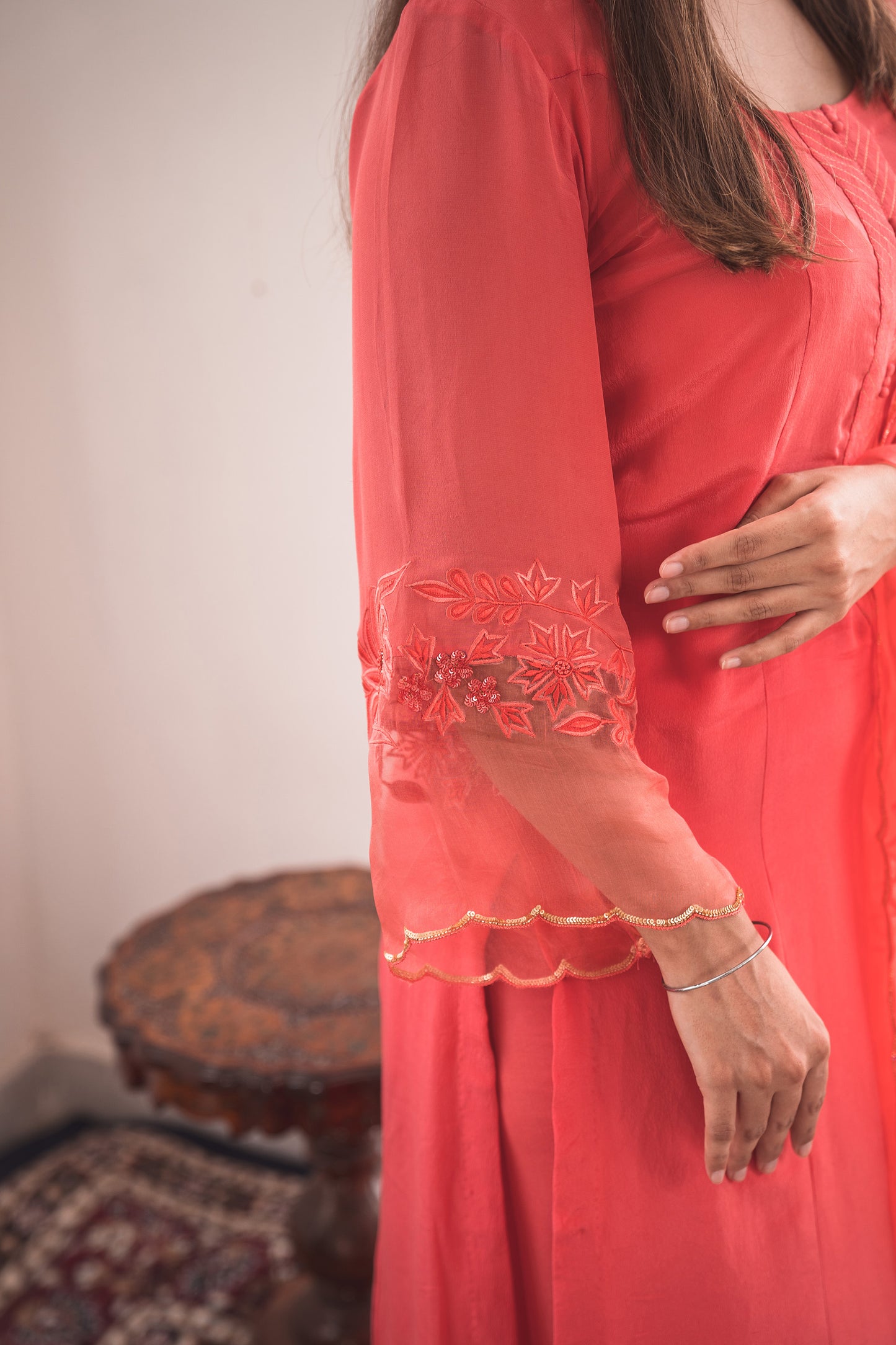 Crepe Kurta Set with Embroidered Pants in Coral